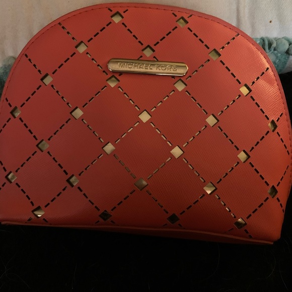 Michael Kors Accessories - Coral colored Michael Kors make up bag